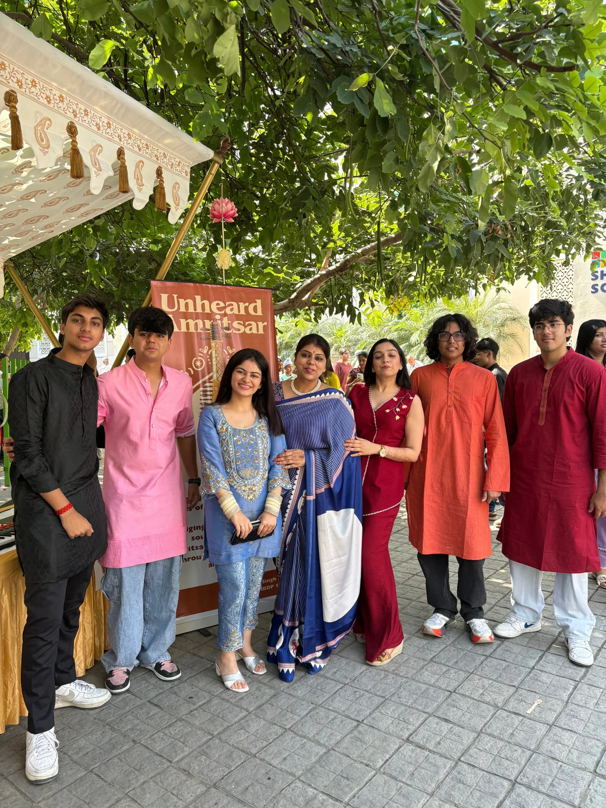 Unheard Amritsar volunteers and community members at a cultural exhibition